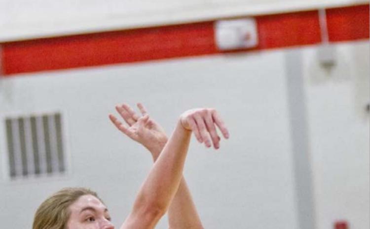 Taylor Allen shoots a three-pointer in a recent game. JEFF LOWE | DISPATCH RECORD
