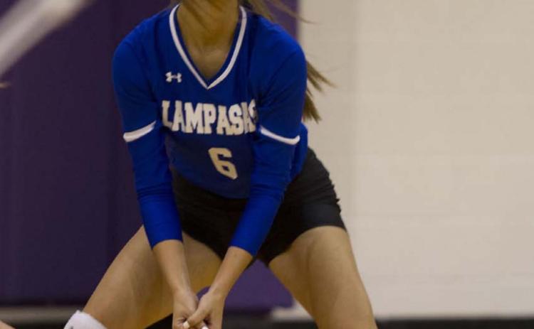 Kayli Syx prepares to complete a pass during a previous match against Florence. The Lady Badgers are set to play the Jarrell Cougars on Tuesday. HUNTER KING | DISPATCH RECORD