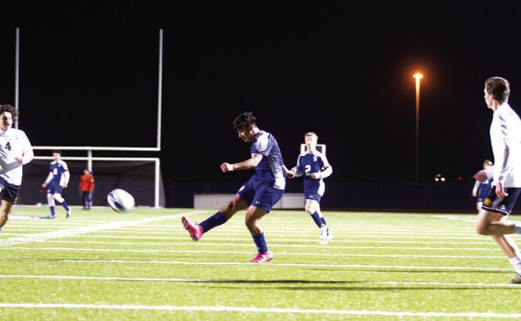 HUNTER KING | DISPATCH RECORD David Flores takes a shot on net during last week’s match.