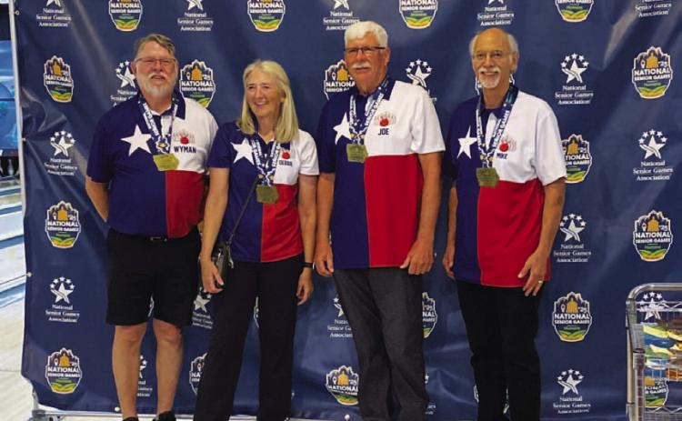 COURTESY PHOTO | WYMAN POWERS Wyman Powers, left, Debra Cathey (Duncanville), Joe Wickens (Georgetown) and Mike Bodien (Bulverde) made up the team that won gold at the National Senior Games.