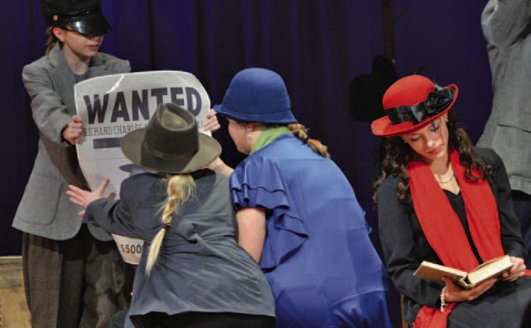Lampasas Middle School students perform a scene from “The 39 Steps Even More Abridged” during their UIL One-Act Play rehearsal last Friday evening. ERICK MITCHELL | DISPATCH RECORD