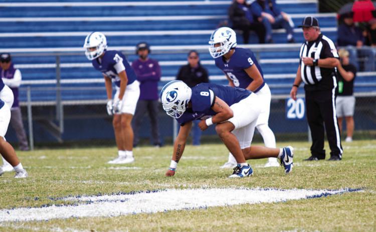 Elias Ayala lines up ready to rush the passer during last Saturday’s game against Marble Falls. HUNTER KING | DISPATCH RECORD