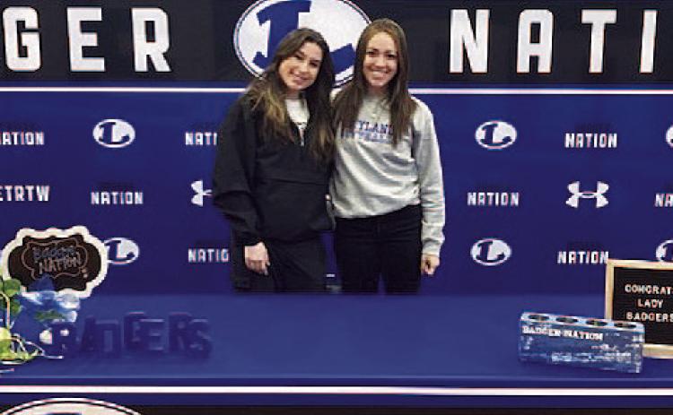 Gracey Ullevig, left, and Hannah Perry both signed last Friday to continue their athletic careers at the college level. Ullevig will be playing volleyball at Temple College, and Perry is going to play softball at Wayland Baptist University. COURTESY PHOTO