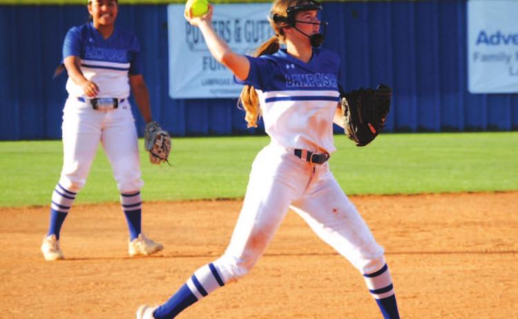 Hadley Oncken throws across to first for an out in the first inning of the Stephenville game. HUNTER KING | DISPATCH RECORD