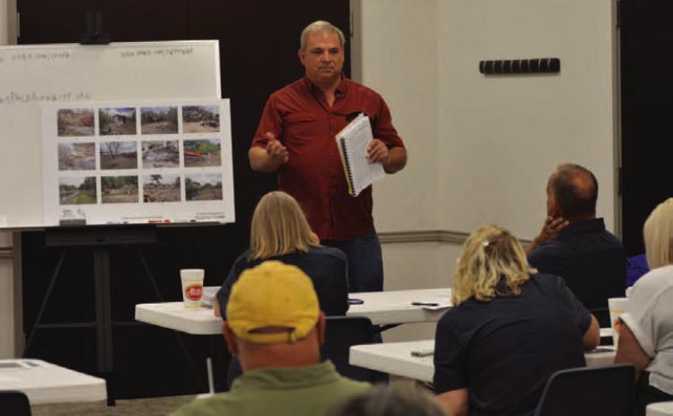 Robert Lansford, the city’s new aviation director, speaks to the Forward Lampasas group last week and describes what is needed at the Lampasas Municipal Airport in terms of expansion and improvements.