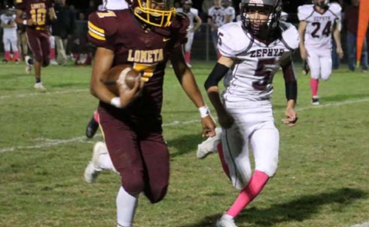 Leonel Caso runs away from a Zephyr defender during Lometa’s homecoming game earlier this year. MEGAN LUSTY| DISPATCH RECORD