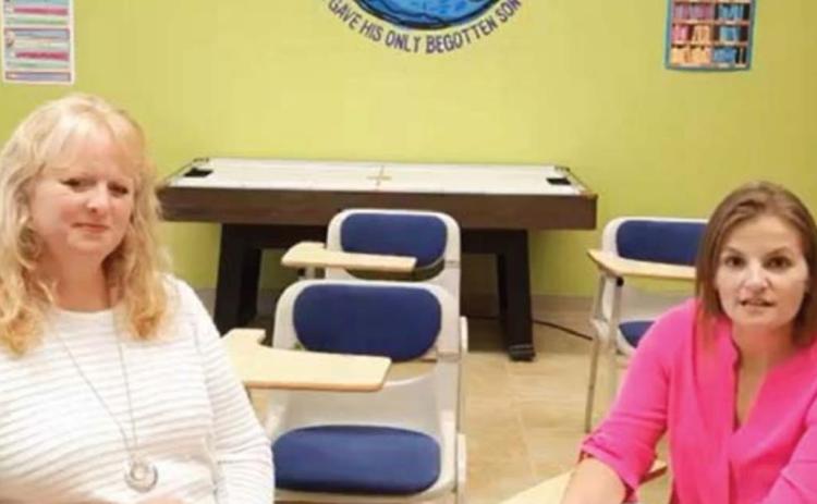 Providence Christian Academy’s Head of Schools April Dwamena, at left, and school board member Betsy Sherock discuss frequently asked questions about the new school in a video posted April 8 on the Providence Facebook page. VERONICA BUTLER | DISPATCH RECORD
