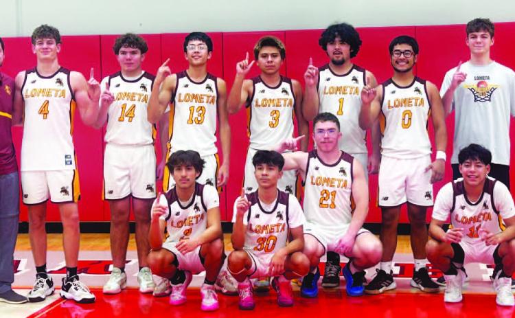 COURTESY PHOTO Hornets’ basketball team poses for a photo at their bi-district playoff game.