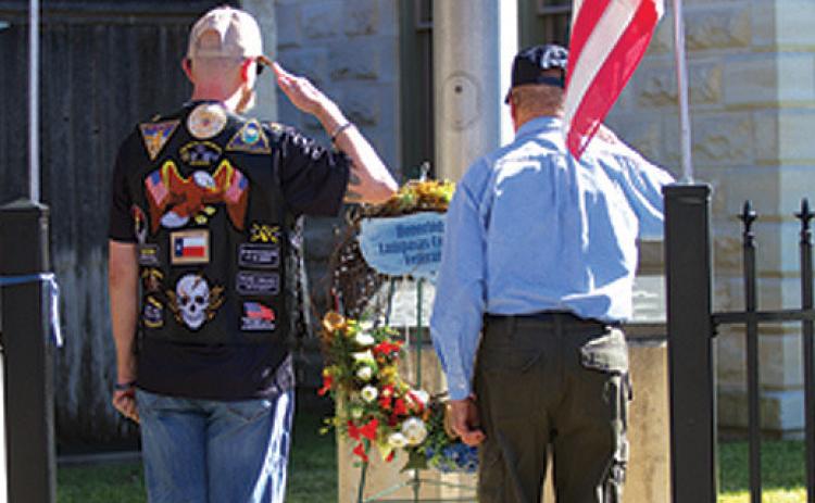 American Legion Post 277 members pay their respects in a wreath-laying ceremony at the Lampasas County Courthouse last year. File Photo