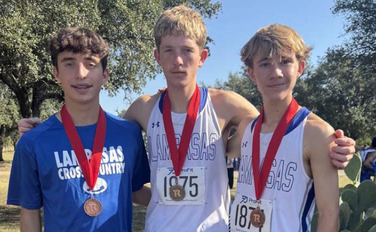 Royce Clary, left, John Keyes and Cohen Watson pose with their medals from the Salado meet. COURTESY PHOTO | KIM BURNSIDE