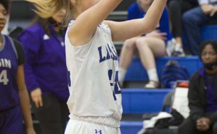 Jamie Ball follows through on a free-throw attempt. HUNTER KING | DISPATCH RECORD