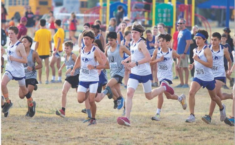 The Lampasas boys’ cross country team takes of from the start line at the Badger home meet on Thursday. HUNTER KING | DISPATCH RECORD