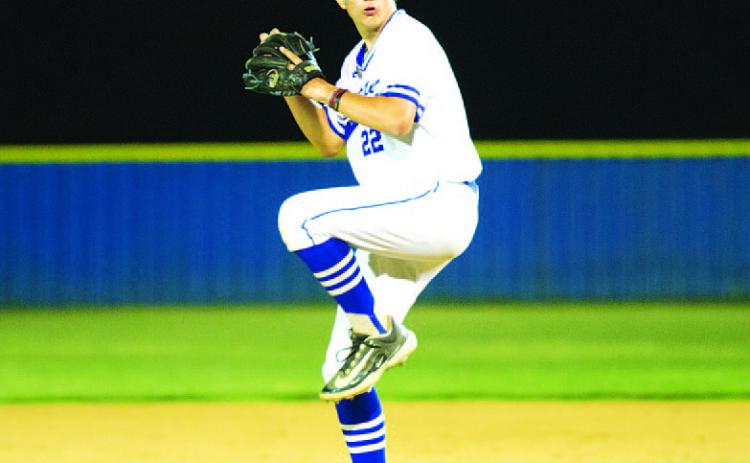 Calvin Phelps winds up to throw a pitch during the bases-loaded jam in the sixth inning. HUNTER KING | DISPATCH RECORD