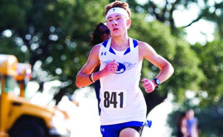 Junior cross country runner Cohen Watson led the Badgers at the invitational meet on Wednesday. Watson finished second in the meet with a time of 17:20. ANA SOFIA MEYER | DISPATCH RECORD