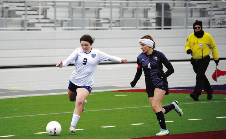 Bella Lindsey prepares to make a pass. The junior will be a leader for the Lady Badgers this season. HUNTER KING | DISPATCH RECORD