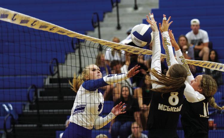 HUNTER KING | DISPATCH RECORD Brylie Turner swings through one of her 13 kills against McGregor on Monday.