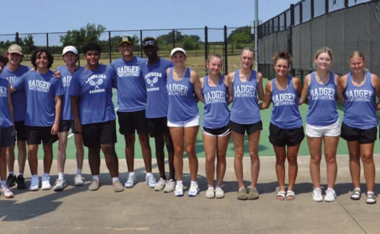 The tennis team poses for a photo after one of their matches last week. COURTESY PHOTO | KENNETH PEISER