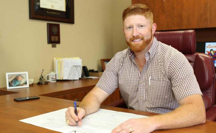 Reese Vann, senior loan officer at MCBank, said participaing in FFA during his youth helped him develop public-speaking and customer-relations skills. COURTESY PHOTO