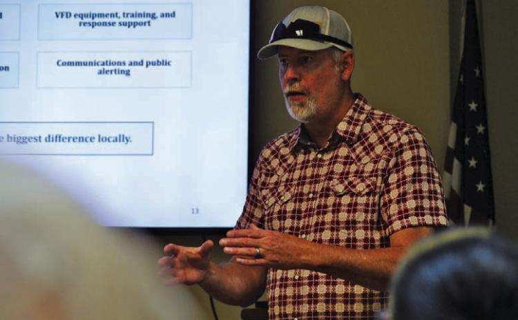 Casey Childers of Natural Resources Solutions discusses the steps the consulting firm will take to develop a wildfire plan for the county that will enable it to apply for grants. ERICK MITCHELL | DISPATCH RECORD