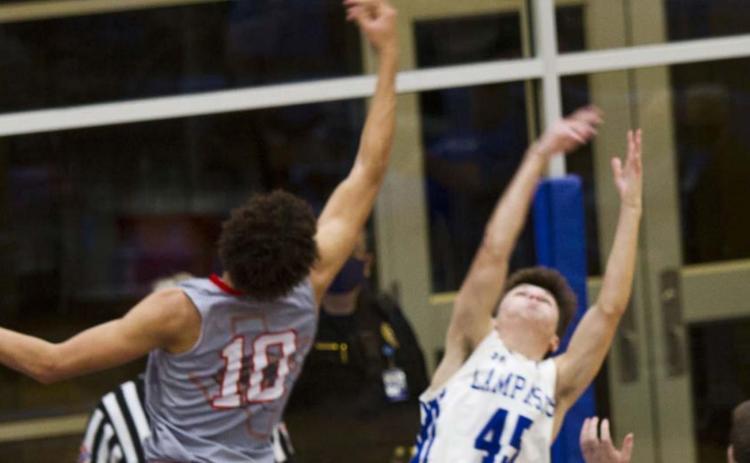 Austin Wilson stretches for a rebound