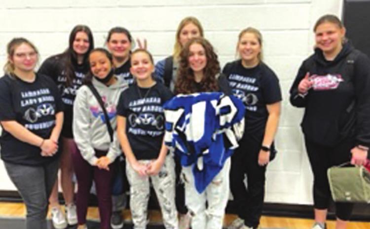 The Lampasas girls’ powerlifting team poses for a photo after a meet earlier this year. COURTESY PHOTO