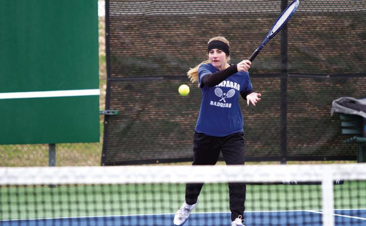 HUNTER KING | DISPATCH RECORD Loretta Hodges swings through a forehand shot during the tournament last Friday afternoon.