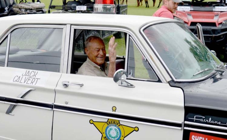 Parade marshal prepares to greet the crowds