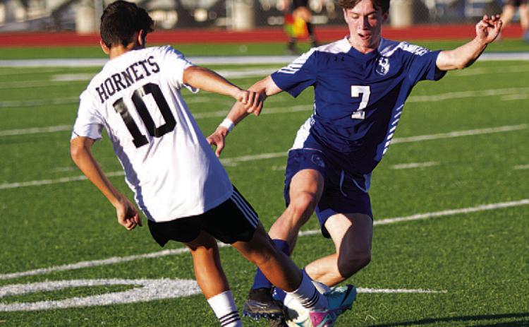 Cooper Pfaltzgraff dribbles around a Gatesville player during last Friday’s match. HUNTER KING | DISPATCH RECORD