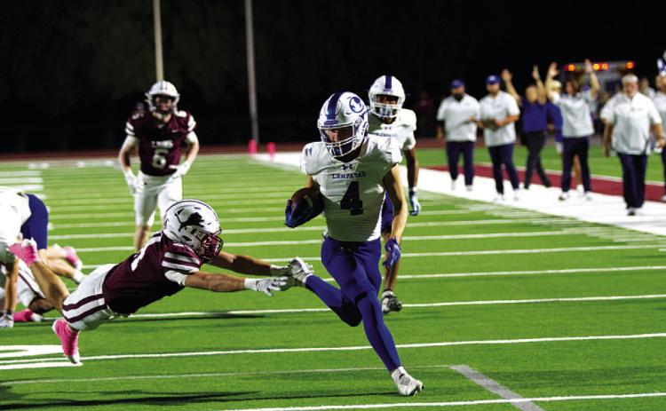 Shawn Roberts evades the Brownwood defender for the first touchdown of the game. HUNTER KING | DISPATCH RECORD