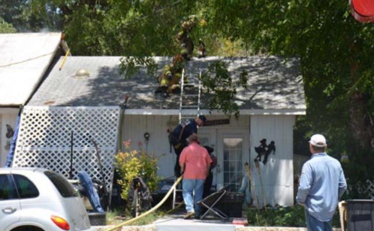 Several agencies responded to a fire on Main Street Tuesday. MONIQUE BRAND | DISPATCH RECORD