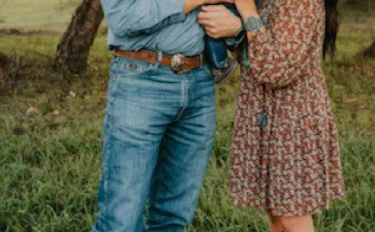 Heston and Stevie McBride recently won an Excellence in Agriculture honor from the Texas Farm Bureau. They are pictured here holding their son, Hetch. courtesy photo