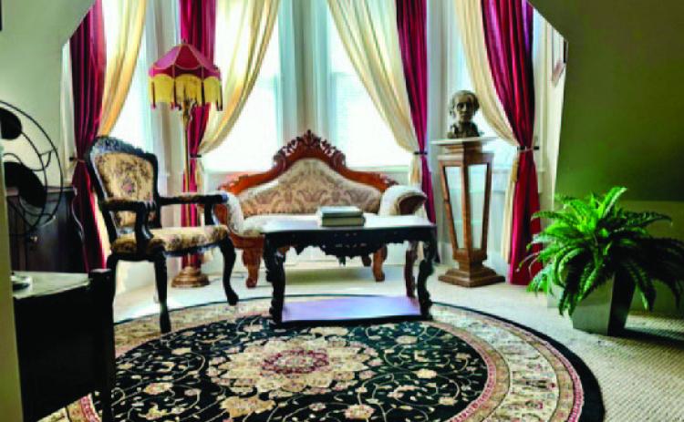 Tucked away in the interior of the beautiful Victorian turret of the Gillen House is this cozy parlor. JOYCESARAH MCCABE | DISPATCH RECORD