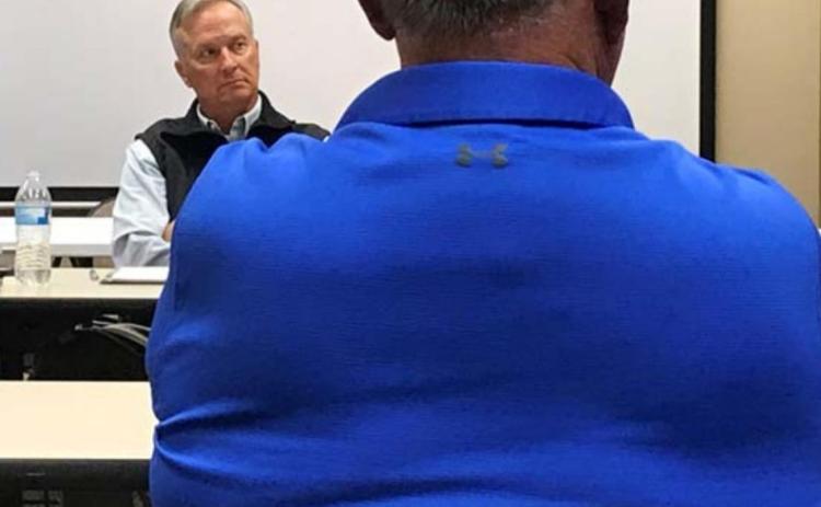 County Judge Randy Hoyer, background, discusses subdivision regulations with county commissioners and development representatives at the Lampasas County Office Building conference room. MONIQUE BRAND | DISPATCH RECORD