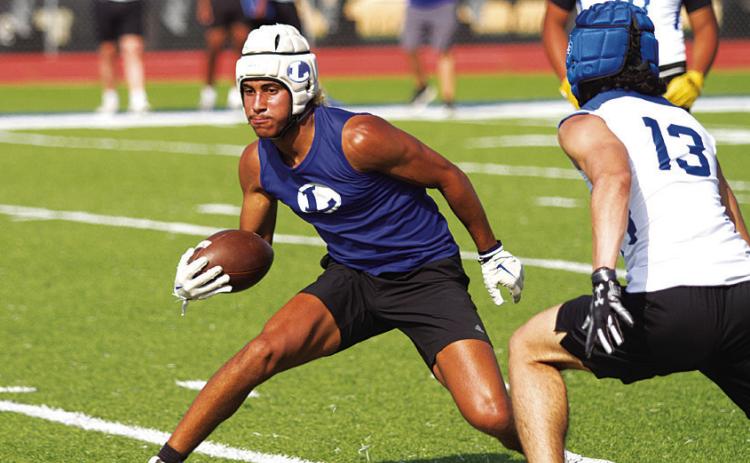 Jaden McElwain plants his foot to juke out a Jarrell defender last Thursday afternoon. HUNTER KING | DISPATCH RECORD