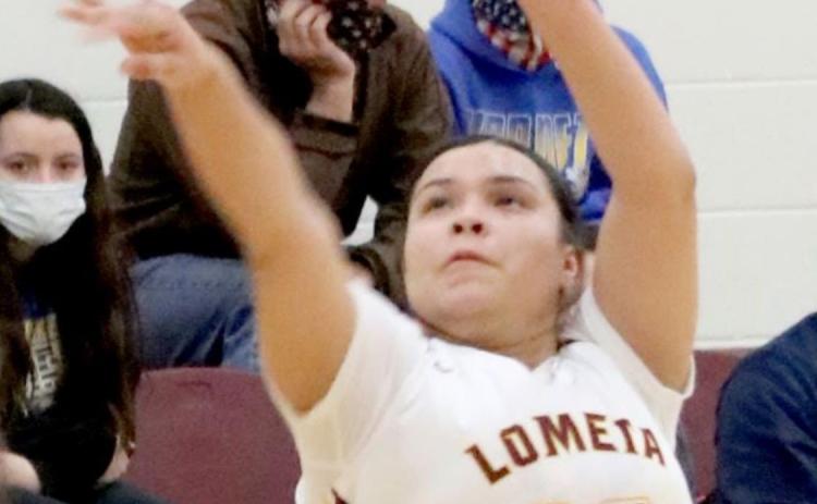 Claudia Carbajal shoots during the Lometa varsity girls’ last district game, on Friday against the Rochelle Lady Hornets. JESSICA MALDONADO | COURTESY PHOTO
