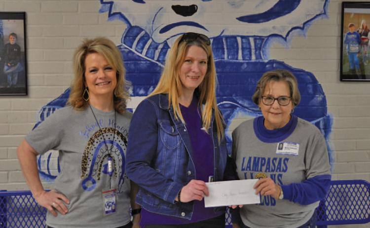 ERICK MITCHELL | DISPATCH RECORD Left to right are LISD Director of School Health Services Donna Clark, Cody Stephens Foundation Heart Screening Director Debbie Doncer and Lampasas Lions Club member Molly Patteson. The Lions Club donated $1,000 for electrocardiogram tests for Lampasas students.
