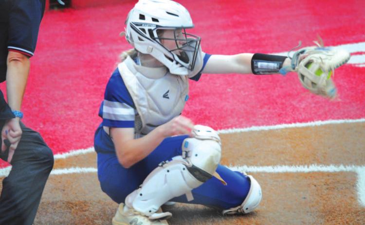 Kali Hunter catches a pitch in her mitt from Caitlyn Sanguinet during the Glen Rose game on Tuesday. HUNTER KING | DISPATCH RECORD