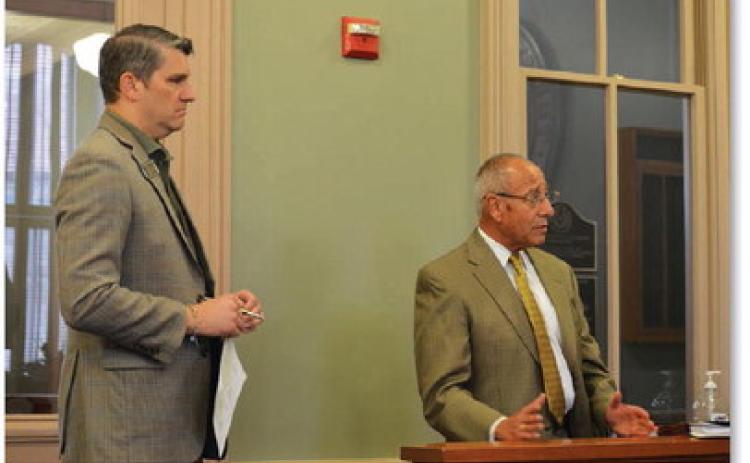 Copperas Cove City Manager Ryan Haverlah (left) and Bill Calderon, founder of Calderon Economic Development Strategies, discuss the purpose behind the tax increment reinvestment zone with county commissioners Oct. 12. ERICK MITCHELL | DISPATCH RECORD