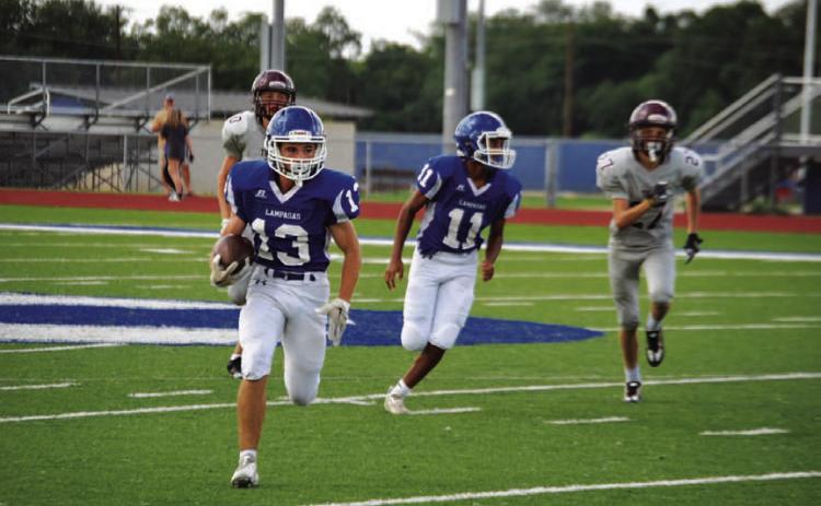 HUNTER KING | DISPATCH RECORD Tate Langford (13) and Jaden McElwain (11) look to continue the freshman team’s winning ways.