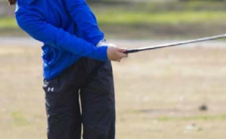 Kenlee Turner hits an approach shot on Hole No. 16. JEFF LOWE | DISPATCH RECORD