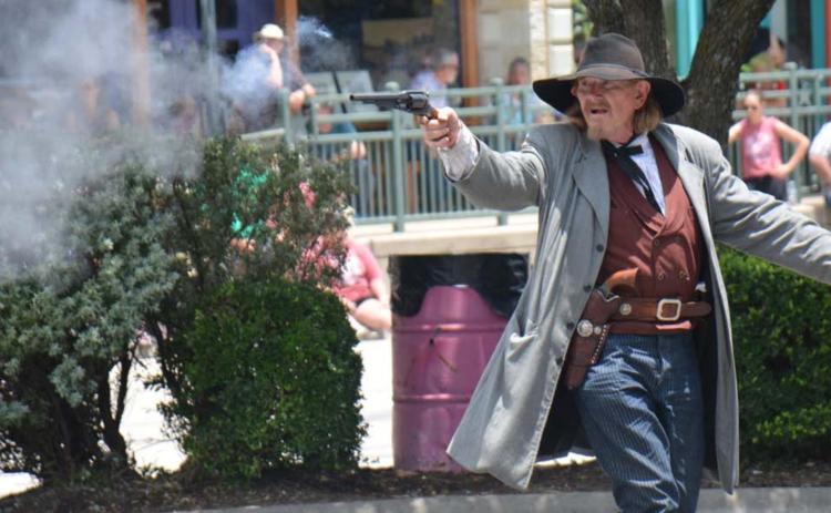 Gunfight re-enactment helps Spring Ho festival end with a bang
