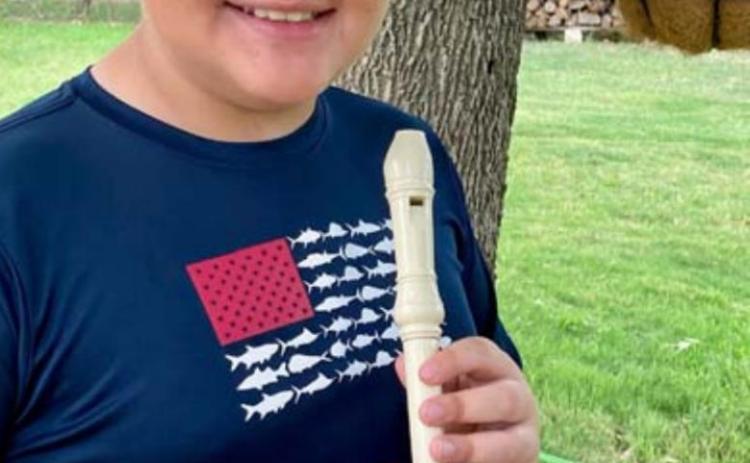 Taylor Creek Elementary student Michael Morrison became the first to complete a “black belt” in the Recorder Karate program. COURTESY PHOTO