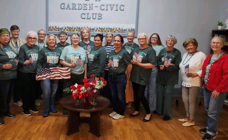 L-M Garden and Civic Club members pose for a group photo at their February gathering. COURTESY PHOTO