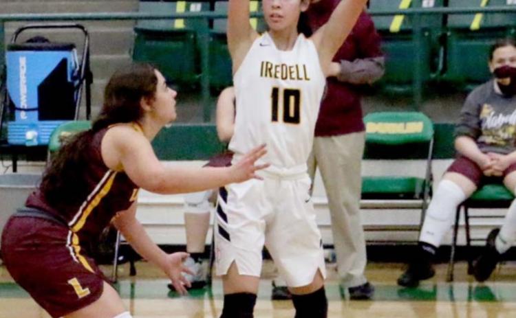 Jasmine Gama guards an Iredell player in the Lady Hornets’ 38-33 seasonending loss in the area playoffs. MEGAN LUSTY | COURTESY PHOTO