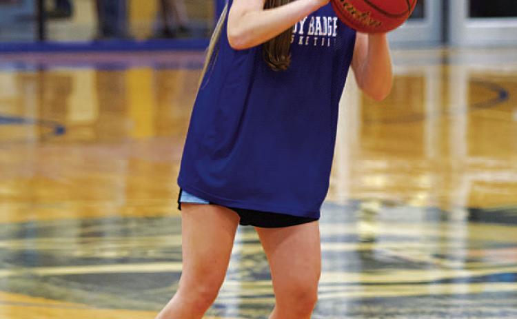 HUNTER KING | DISPATCH RECORD Addison Borchardt shoots a three during summer league.