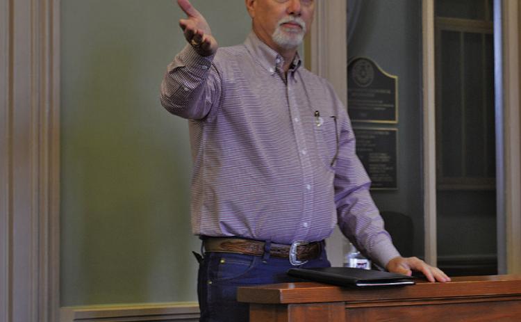 Corix Utilities-Texas President Darrin Barker makes remarks at Monday’s Lampasas County Commissioners Court meeting. He noted upgrades the water system is undergoing and addressed the effect potential new subdivision projects, such as the Pitt Creek Ranch development, might have on Corix customers. ERICK MITCHELL | DISPATCH RECORD