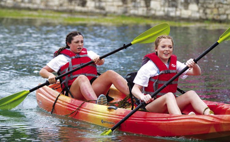 Kayak races feature adult and youth tandem categories, as well as adult singles. ERICK MITCELL | DISPATCH RECORD