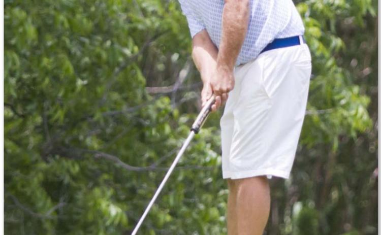 Justin Schulze putts on Hole No. 11 at Hancock Park Golf Course on Saturday afternoon. JEFF LOWE | DISPATCH RECORD