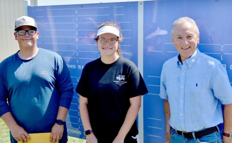 Rory Magill, left, and Kelsea Moyer, center, are shown with 1963 LHS grad Phillip King, who awarded the two seniors with a $500 scholarship apiece. The Phillip King Tennis Scholarship has been awarded annually since 2014 to one Badger and one Lady Badger based on their performance on the court and in acadmics, their “coachability,” leadership, dedication and other factors. KENNETH PEISER | COURTESY PHOTO