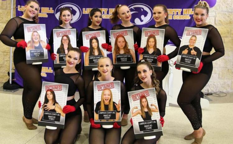 Flames members who performed in their novelty routine at the March 5 Liberty Hill event are, front row from left, April Smith, Kelsey Grimmett and Brooklyn Morris; back row, left to right, Anna Jorstad, Sydney Lesley, Isabell Marks, Madisyn Moreland, Keely Carl and Jaycee Lockhart. COURTESY PHOTO | CHRIS MILES